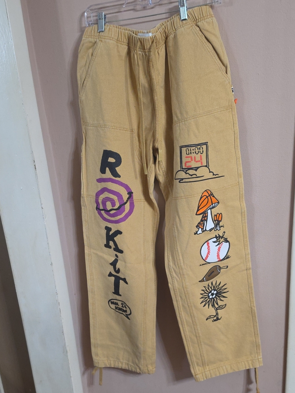 Tan Graphic Jogger Pants with Purple Accents